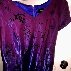 Virgo purple knee length silk dress with shiny black appliqué flowers. Size 18